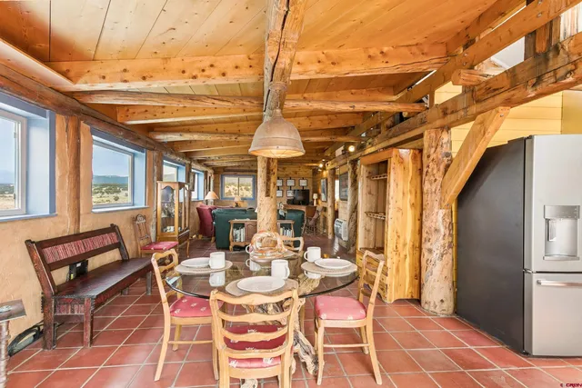 a dining room with furniture