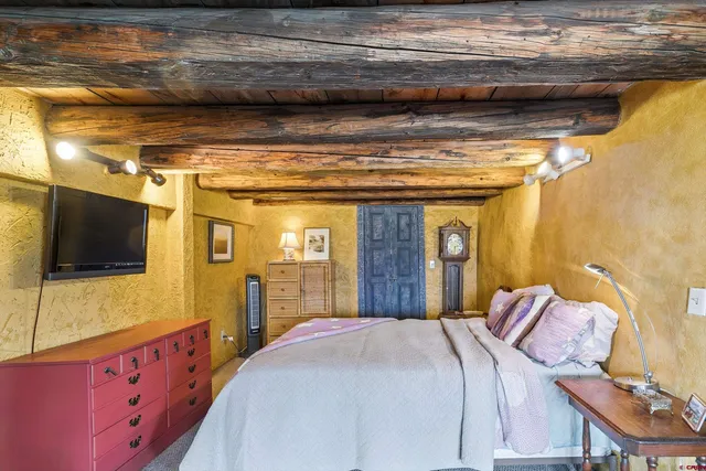 a view of a bathroom with sink and mirror
