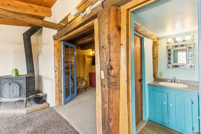 a bedroom with bed and window