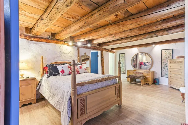 a room with furniture and wooden floor