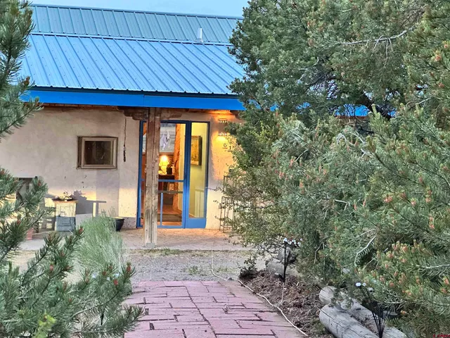 a view of a house with a ocean view