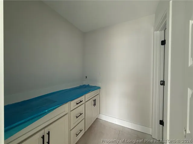 a view of a bathroom from the hallway