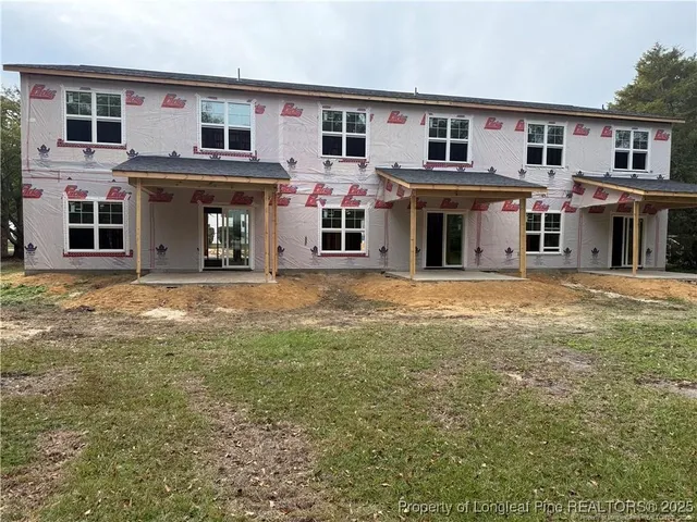 a view of a house with many windows