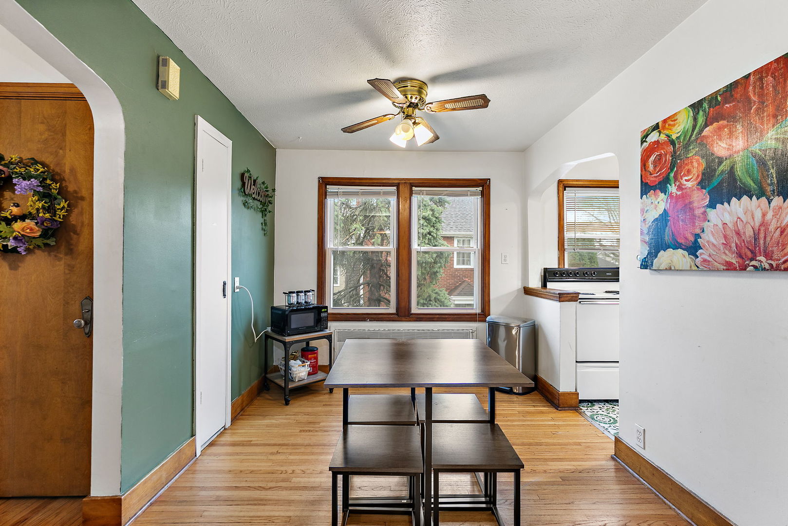 820 Lincoln Highway Rochelle, IL 61068 - Photo 8 of 27 a view of a dining room with furniture window and wooden floor