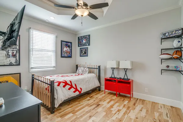 a bedroom with furniture and window