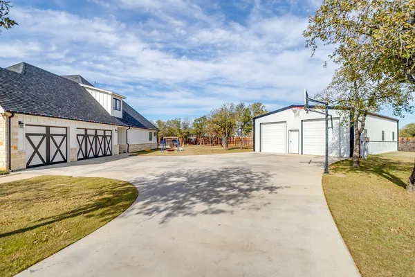a view of large house with a yard