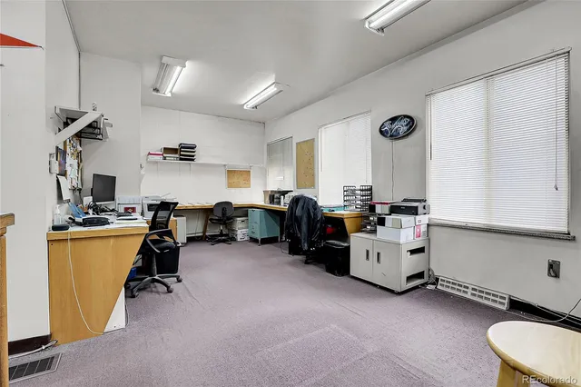 a room with furniture and a window