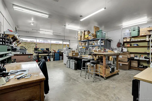 a room with lots of furniture and clutter