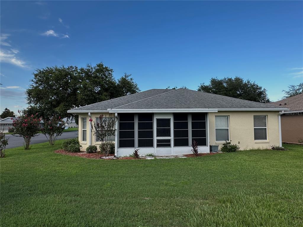9706 Southwest 92nd Place Road Ocala, FL 34481 - Photo 34 of 82 a view of a house with a yard