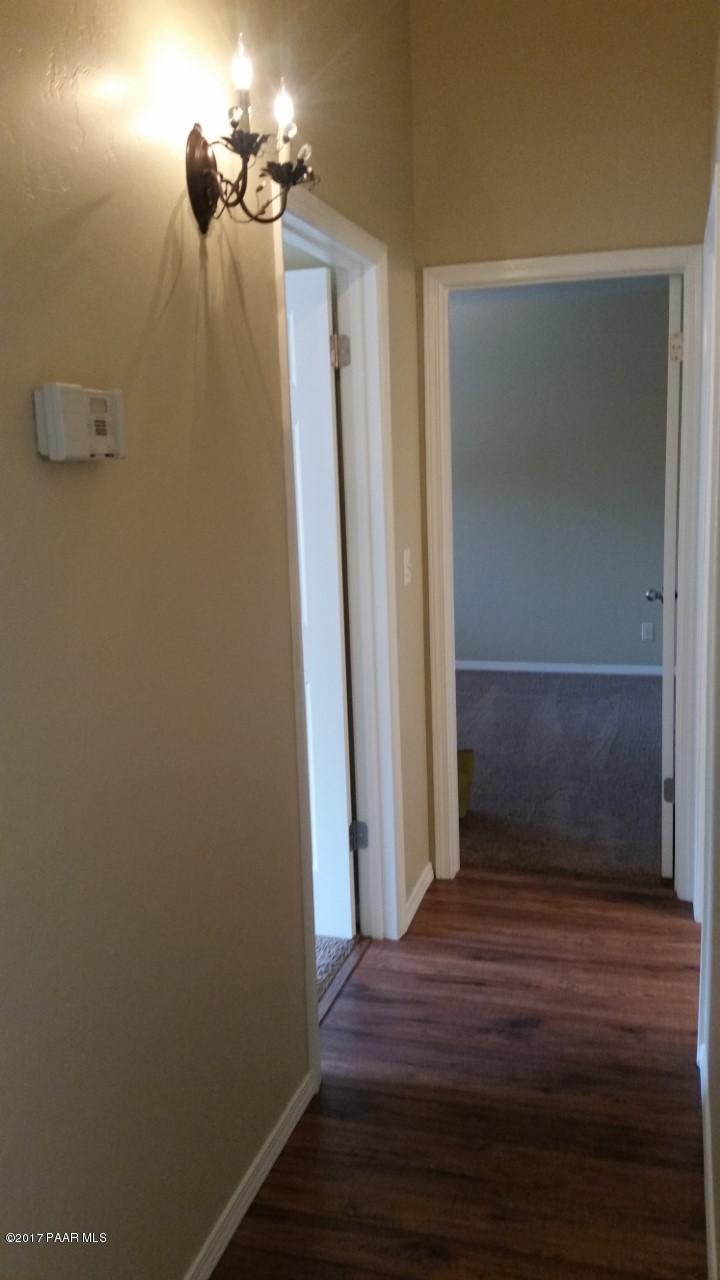 903 Old Stage Road, Unit A7 Prescott, AZ 86303 - Photo 24 of 33 Hallway to back bdrms