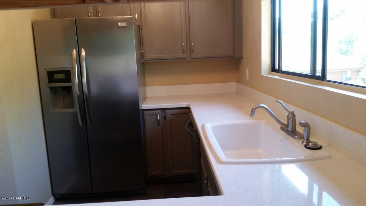 903 Old Stage Road, Unit A7 Prescott, AZ 86303 - Photo 9 of 33 Kitchen with sink and Fridge