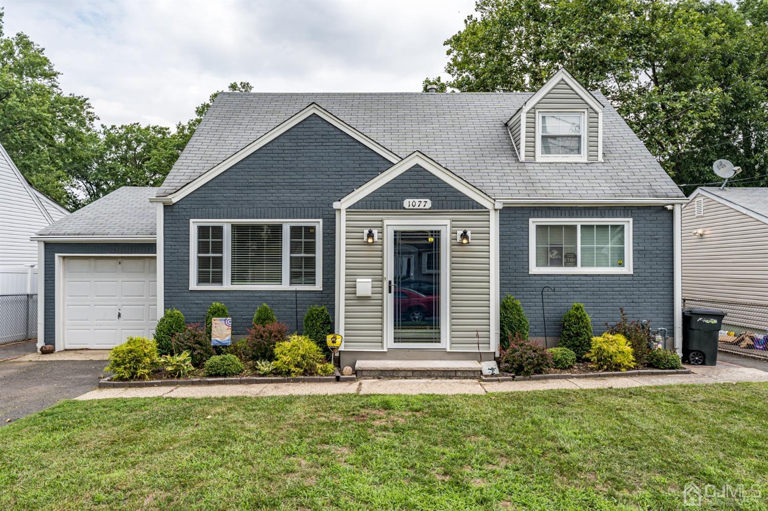 1077 Cranbrook Road Union, NJ 07083 - Photo 1 of 37 front view of a house with a yard