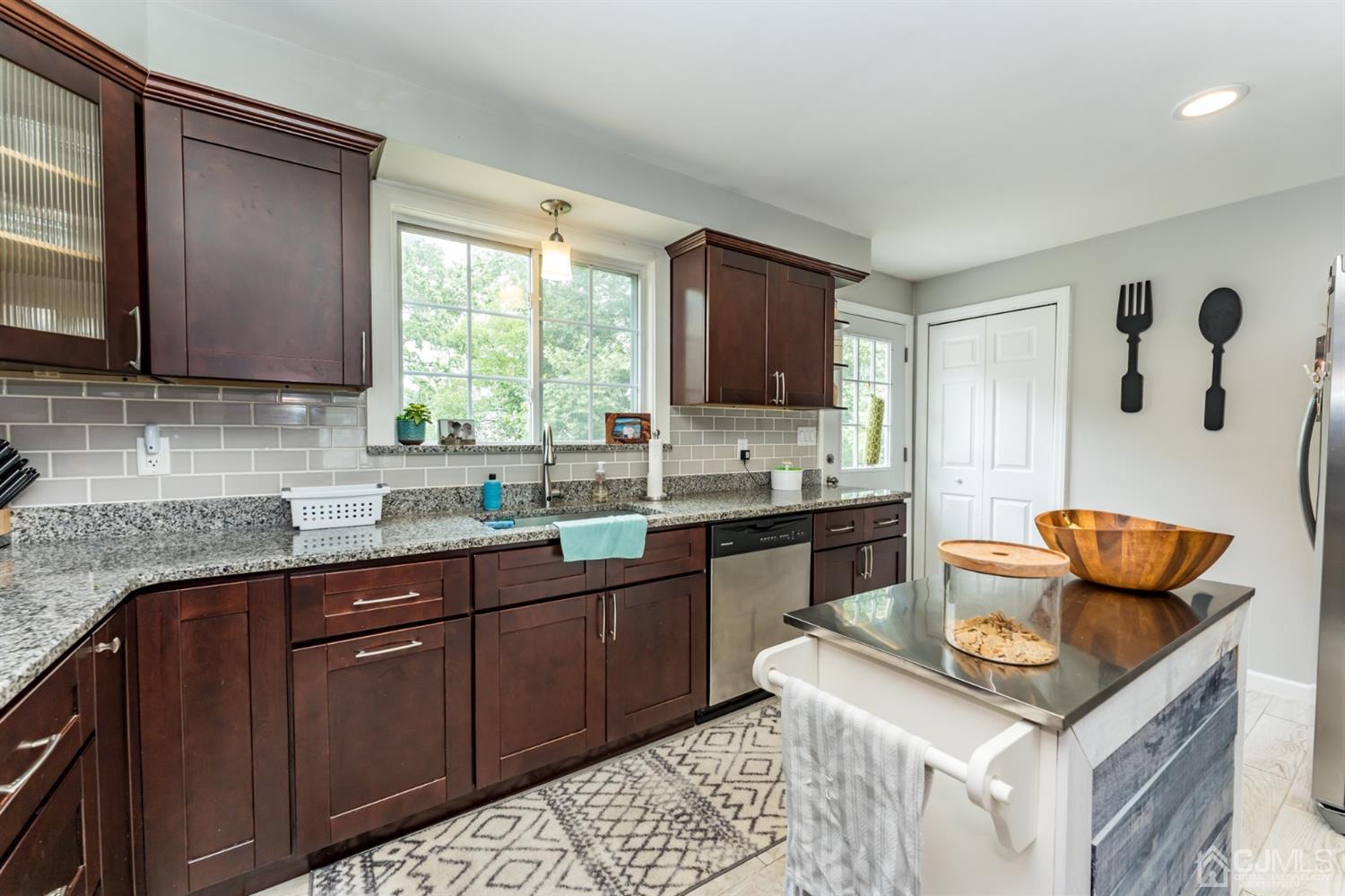 1077 Cranbrook Road Union, NJ 07083 - Photo 15 of 37 a kitchen with a sink cabinets and window