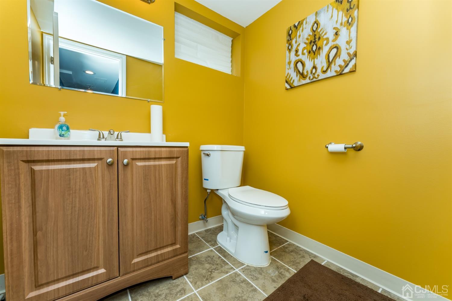 1077 Cranbrook Road Union, NJ 07083 - Photo 26 of 37 a bathroom with a toilet and a sink