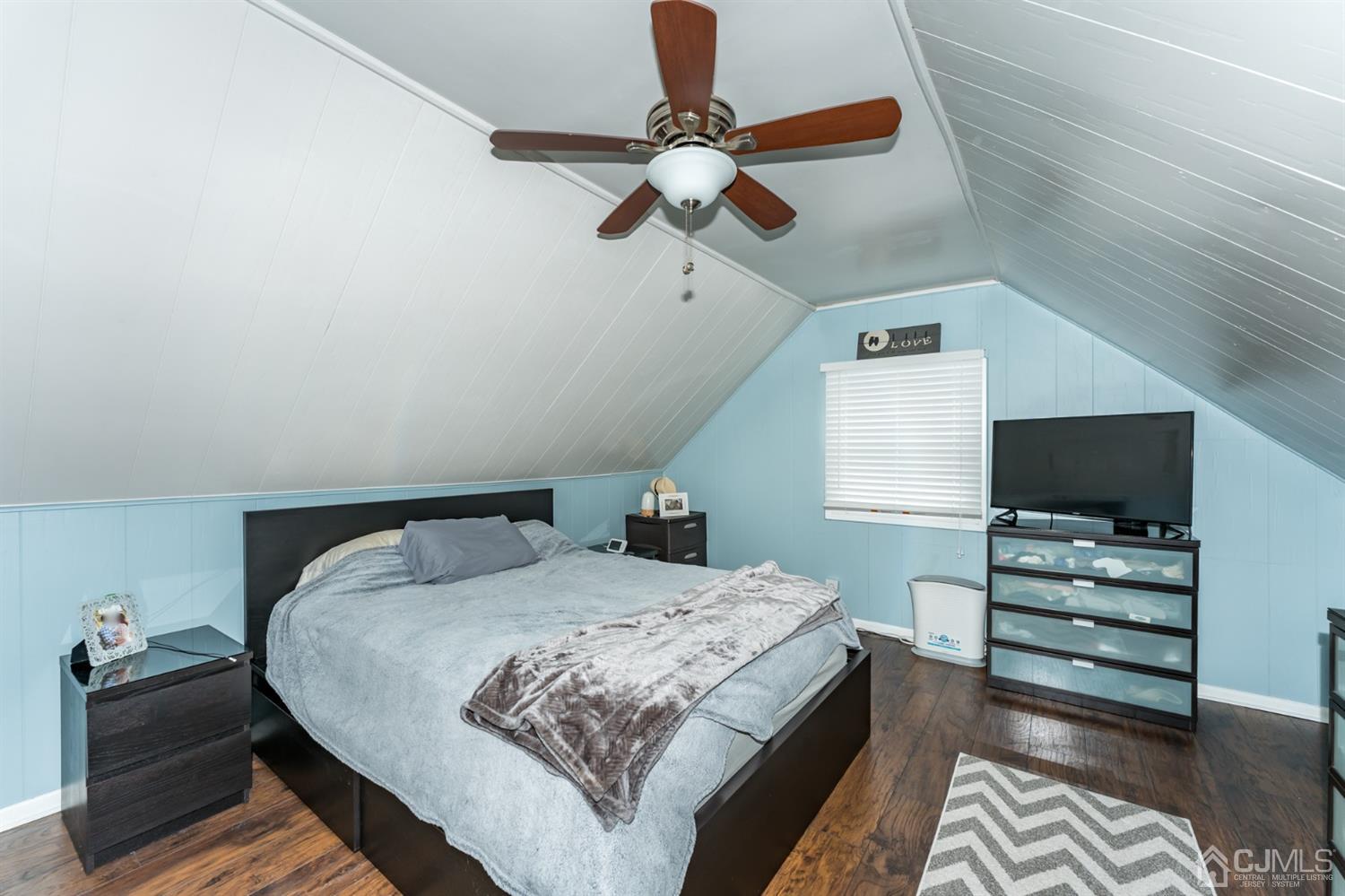 1077 Cranbrook Road Union, NJ 07083 - Photo 29 of 37 a bedroom with a bed and a flat screen tv
