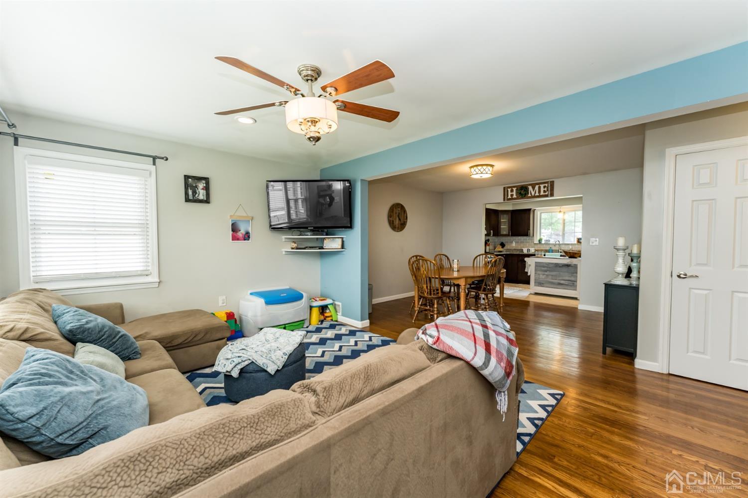 1077 Cranbrook Road Union, NJ 07083 - Photo 4 of 37 a living room with furniture and kitchen view
