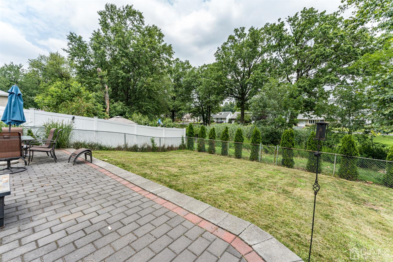 1077 Cranbrook Road Union, NJ 07083 - Photo 35 of 37 a backyard of a house with lots of green space
