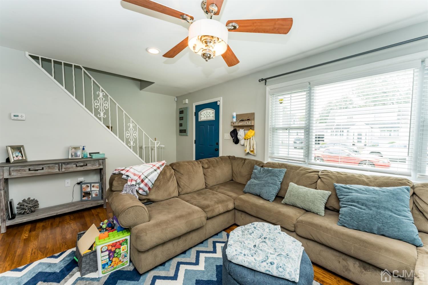 1077 Cranbrook Road Union, NJ 07083 - Photo 6 of 37 a living room with furniture and a large window