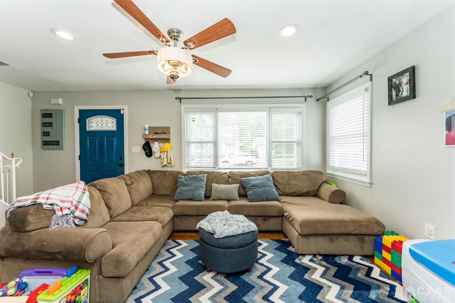 1077 Cranbrook Road Union, NJ 07083 - Photo 7 of 37 a living room with furniture and a large window
