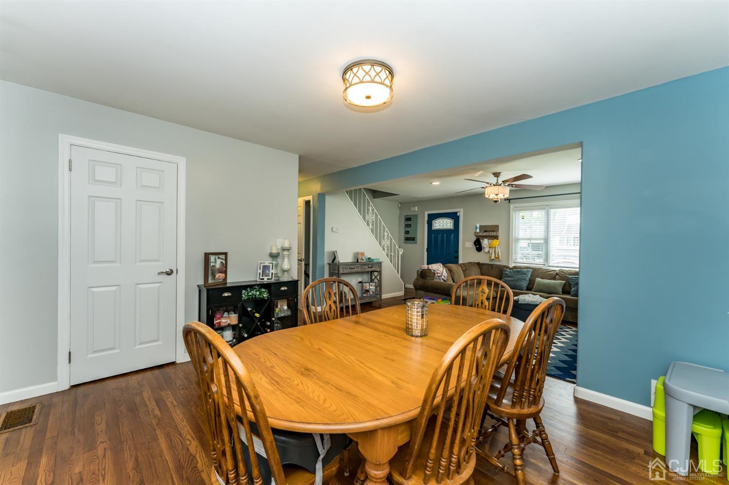 1077 Cranbrook Road Union, NJ 07083 - Photo 10 of 37 a view of a dining room with furniture and wooden floor