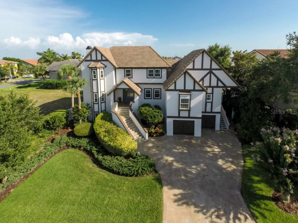 Beauty and quality is found in this home.  Recently painted in 2013; Cement Tile roof in 2007;  and Steel impact rated garage doors (150 mph)