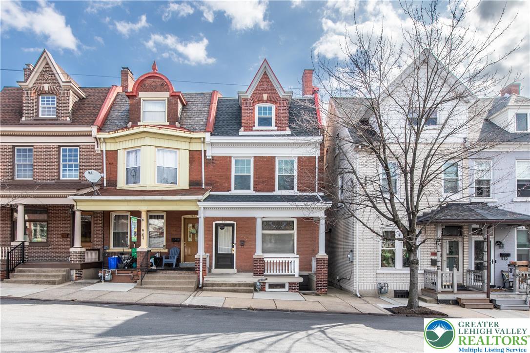 420 2nd Avenue Bethlehem, PA 18018 - Photo 1 of 34 a front view of a residential apartment building with a yard