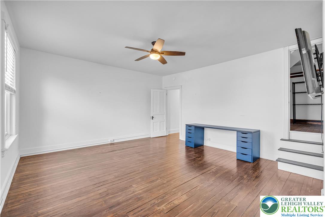 420 2nd Avenue Bethlehem, PA 18018 - Photo 16 of 34 a view of an empty room with wooden floor and a window