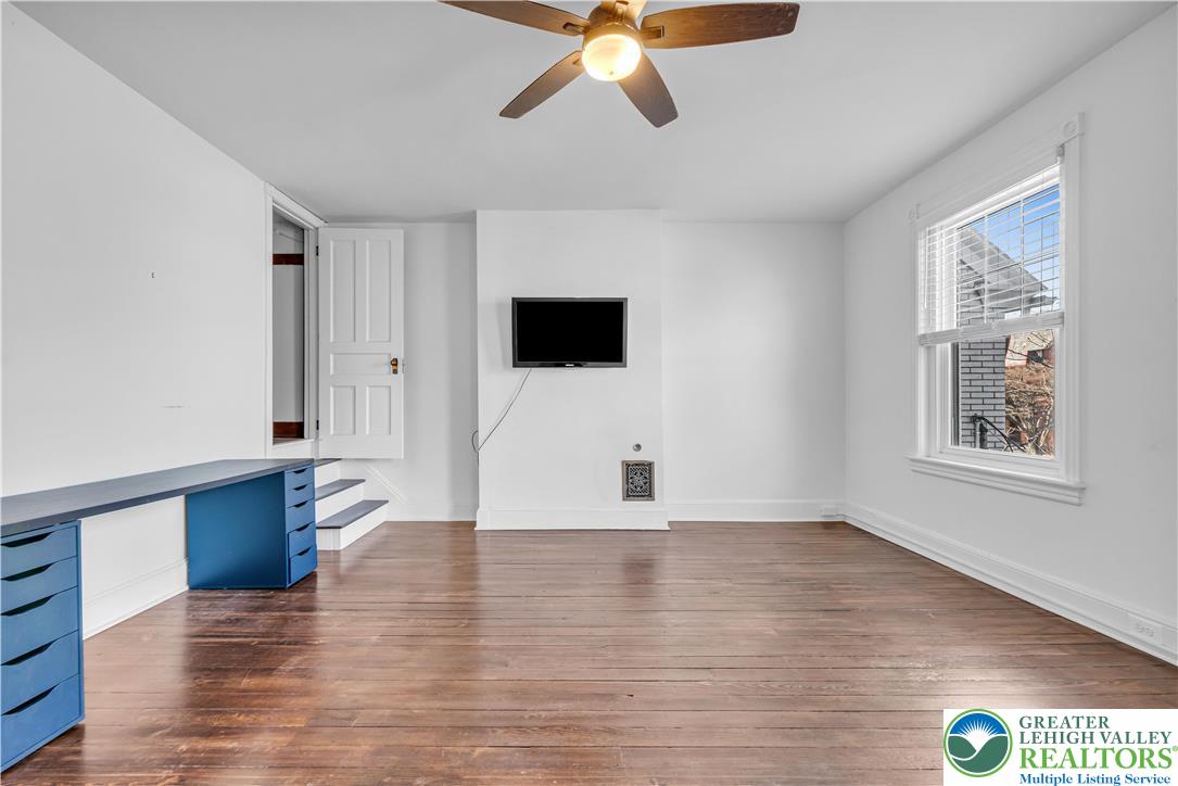 420 2nd Avenue Bethlehem, PA 18018 - Photo 18 of 34 a view of an empty room with window and wooden floor