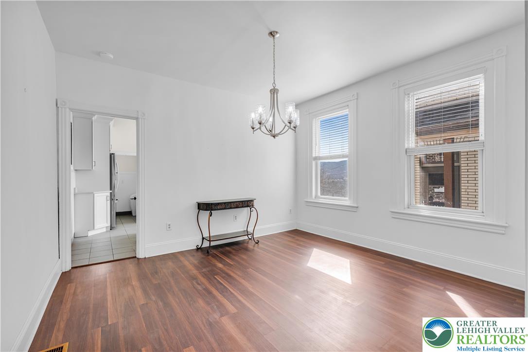 420 2nd Avenue Bethlehem, PA 18018 - Photo 6 of 34 a view of a livingroom with wooden floor and a window