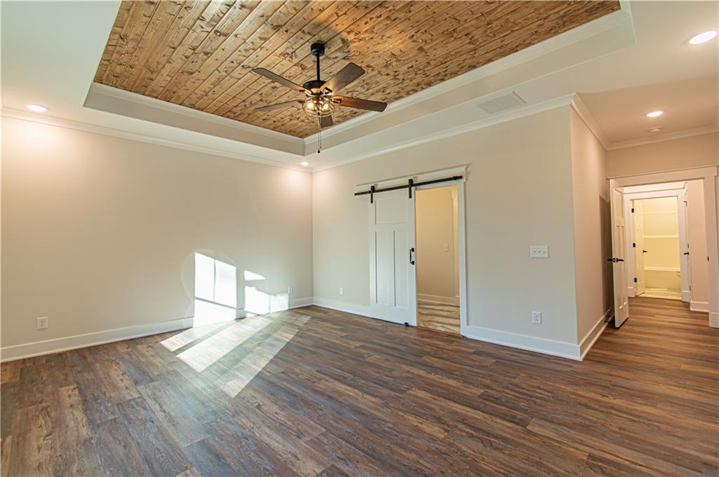 386 Mulberry Circle Jasper, GA 30143 - Photo 27 of 46 a view of an empty room and wooden floor