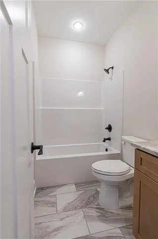 a room with a window and wooden floor