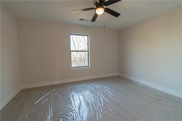 a view of an empty walk in closet