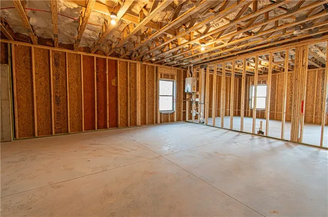 a view of a room with wooden walls