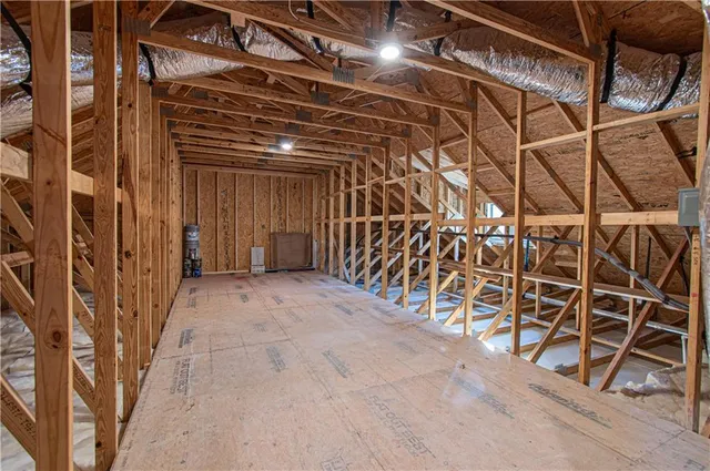 a view of an empty room with windows