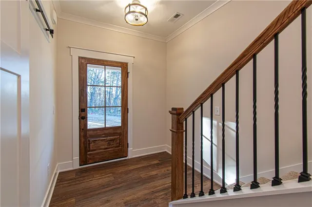 a view of front door with stairs