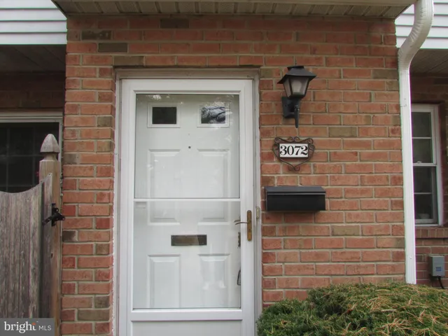 a brick house with a door