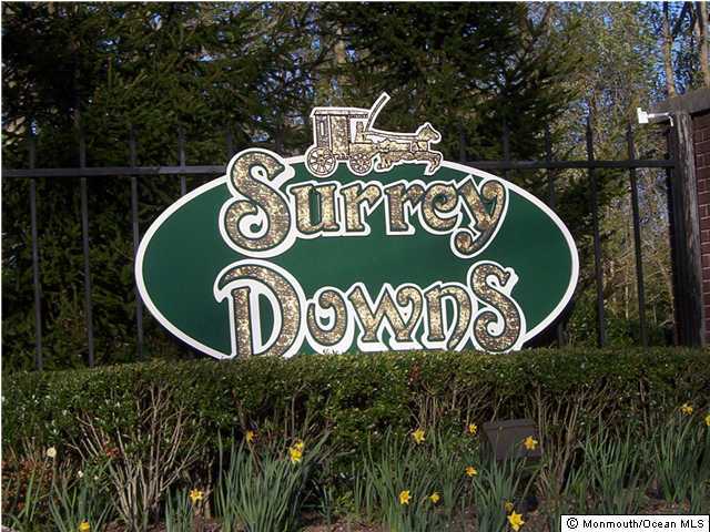 27 Linton Close Freehold, NJ 07728 - Photo 2 of 3 a sign that is on a wooden wall