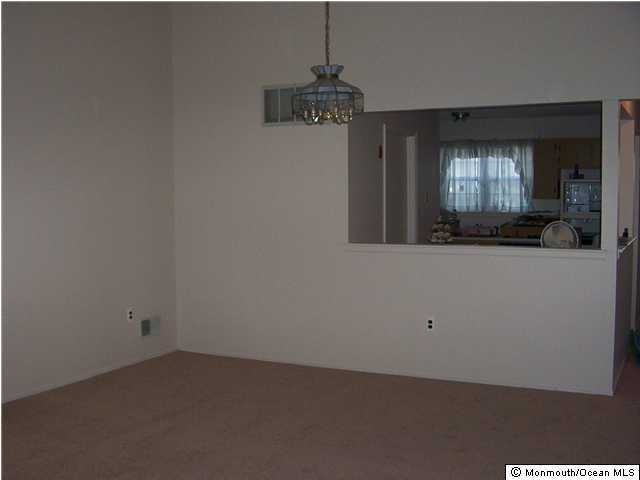 27 Linton Close Freehold, NJ 07728 - Photo 3 of 3 a view of empty room with window