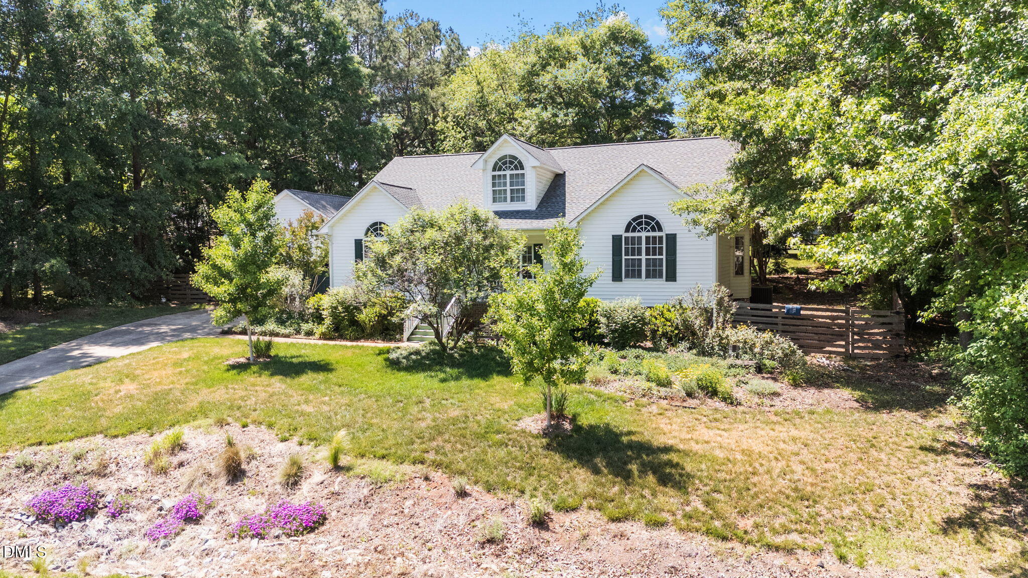 6820 Oviedo Drive Raleigh, NC 27603 - Photo 47 of 50 a view of a house with a yard