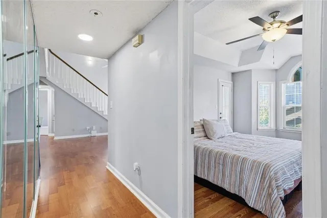 a kitchen with stainless steel appliances granite countertop a sink a stove a microwave and cabinets