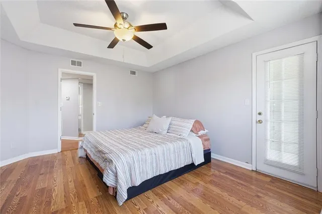 a bathroom with a sink vanity and a mirror
