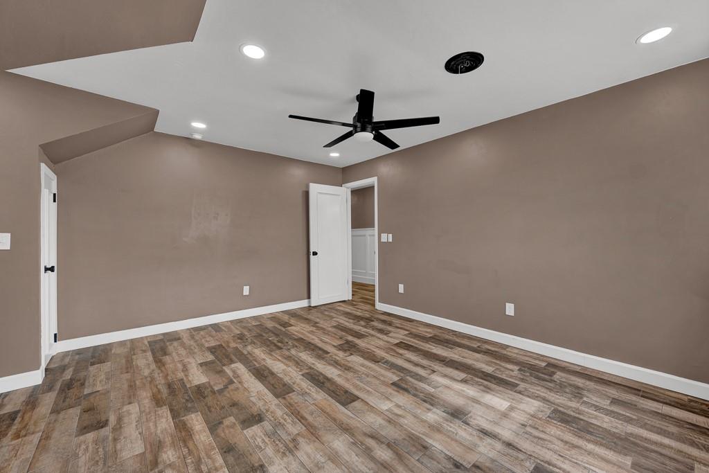 6117 Gainsborough Road Amarillo, TX 79106 - Photo 26 of 40 a view of a livingroom with a ceiling fan