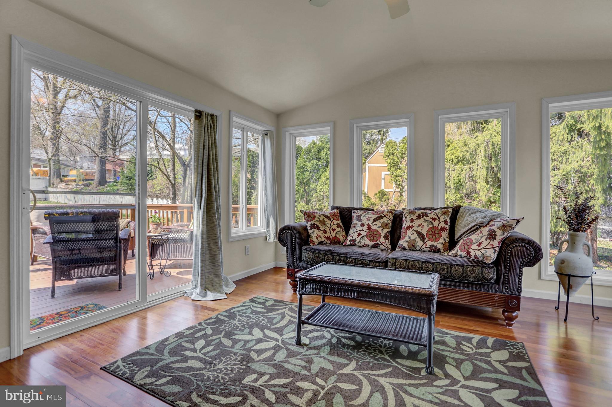 807 5th Street New Cumberland, PA 17070 - Photo 8 of 25 Enclosed porch walks out to deck