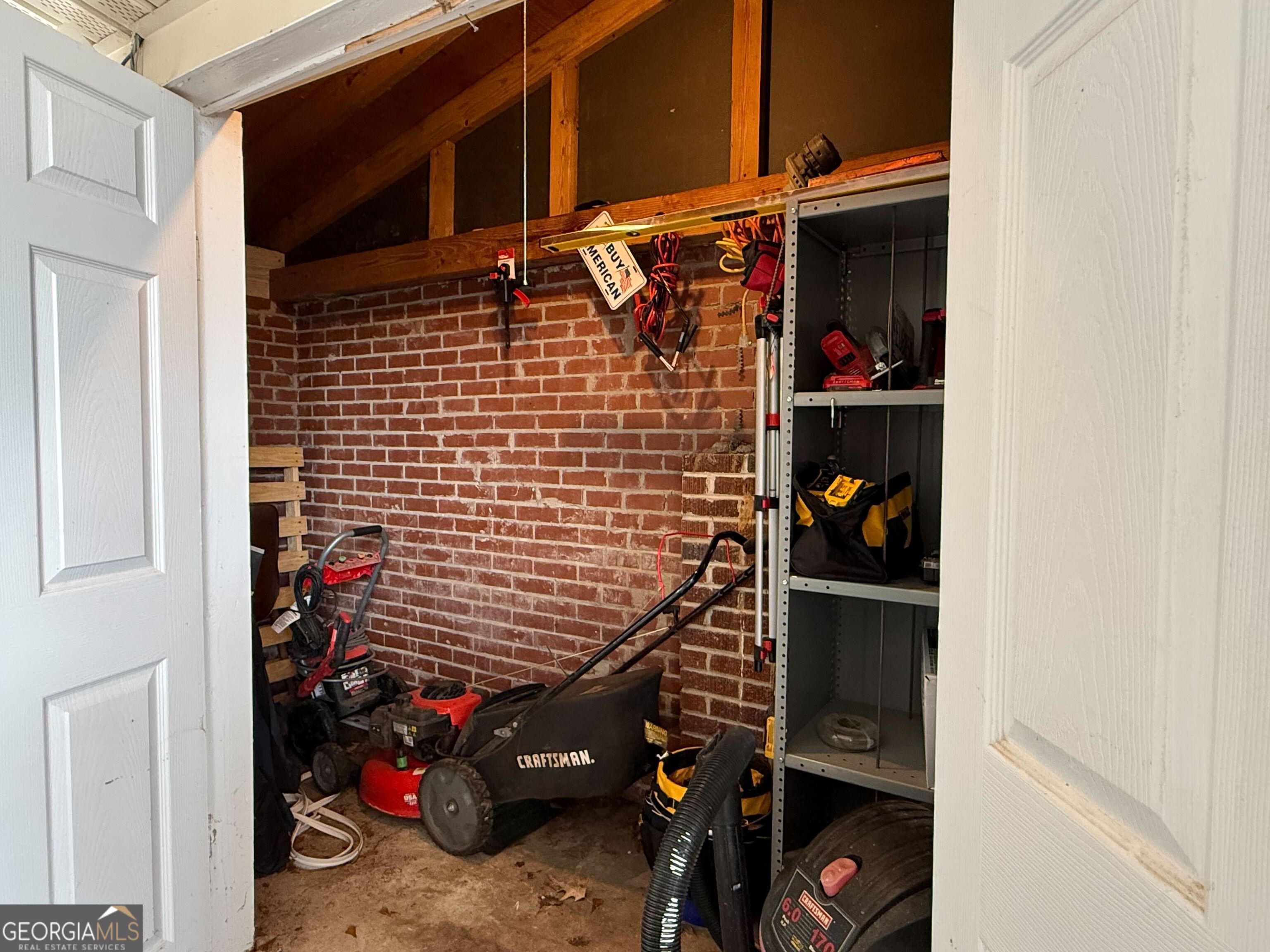 804 Betty Street Sandersville, GA 31082 - Photo 16 of 21 a view of a door and car parked beside a road