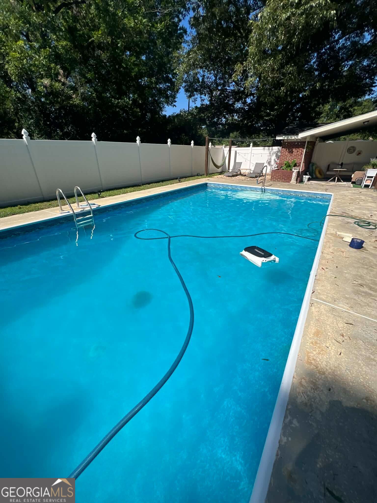 804 Betty Street Sandersville, GA 31082 - Photo 20 of 21 a view of a balcony with yard