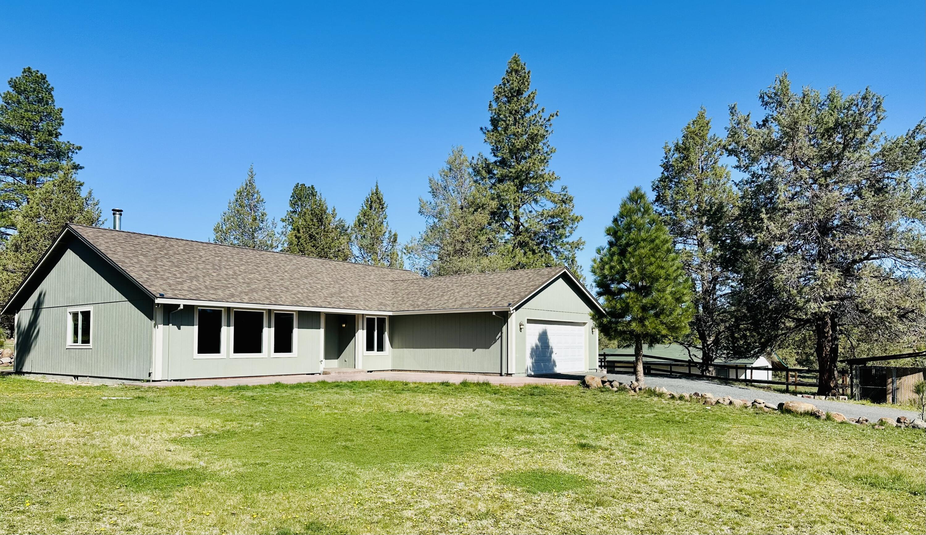 16524 Fieldcrest Road Klamath Falls, OR 97603 - Photo 1 of 58 a front view of a house with a yard
