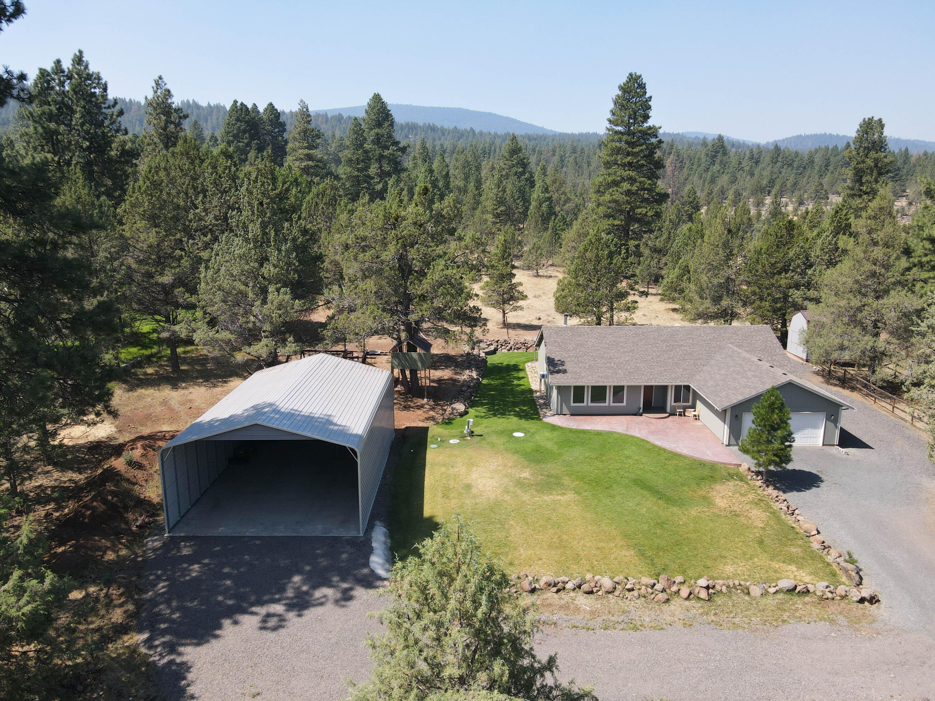 16524 Fieldcrest Road Klamath Falls, OR 97603 - Photo 2 of 58 a view of a house with a yard and street
