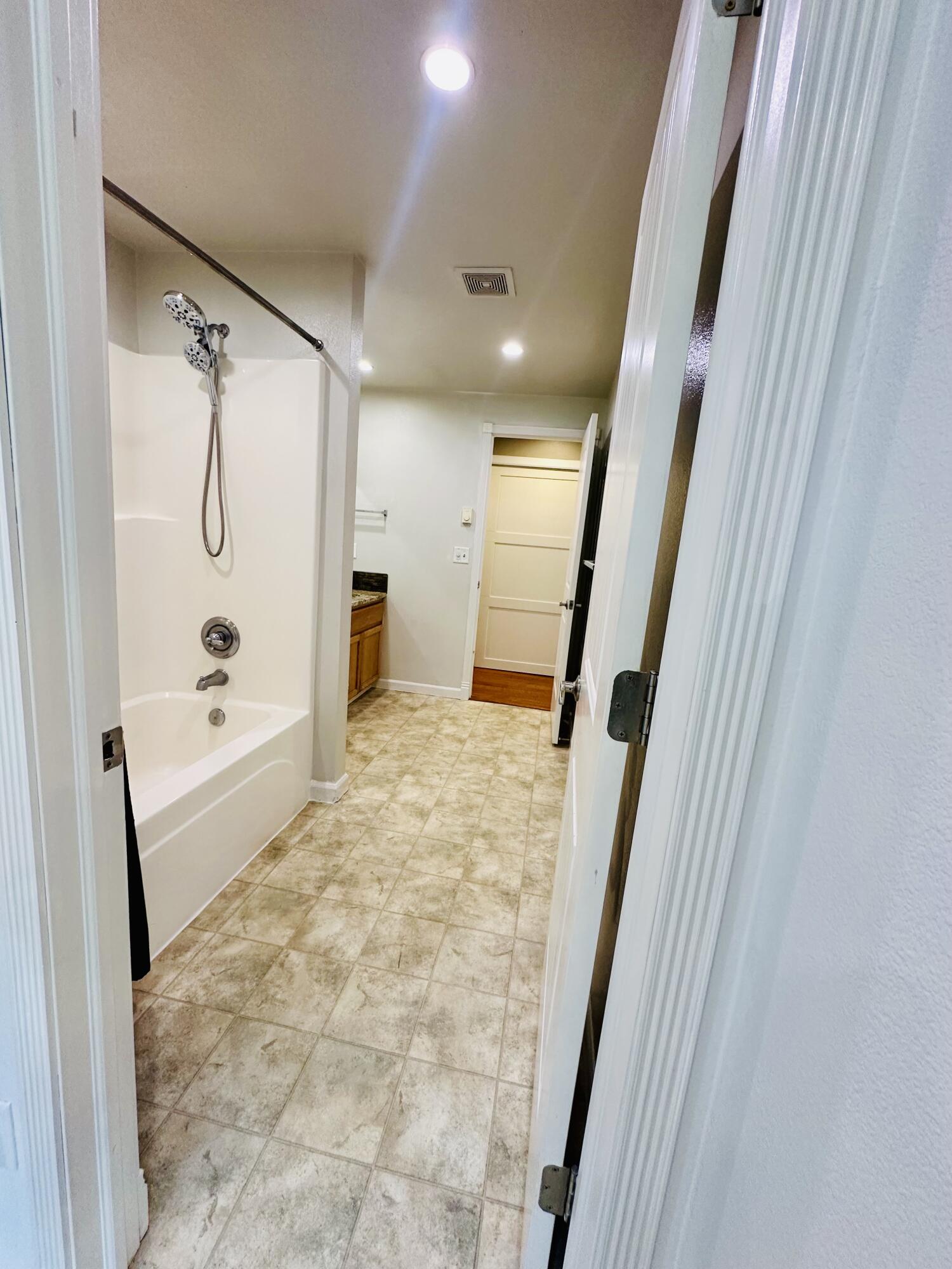 16524 Fieldcrest Road Klamath Falls, OR 97603 - Photo 27 of 58 a bathroom with bathtub shower and a sink