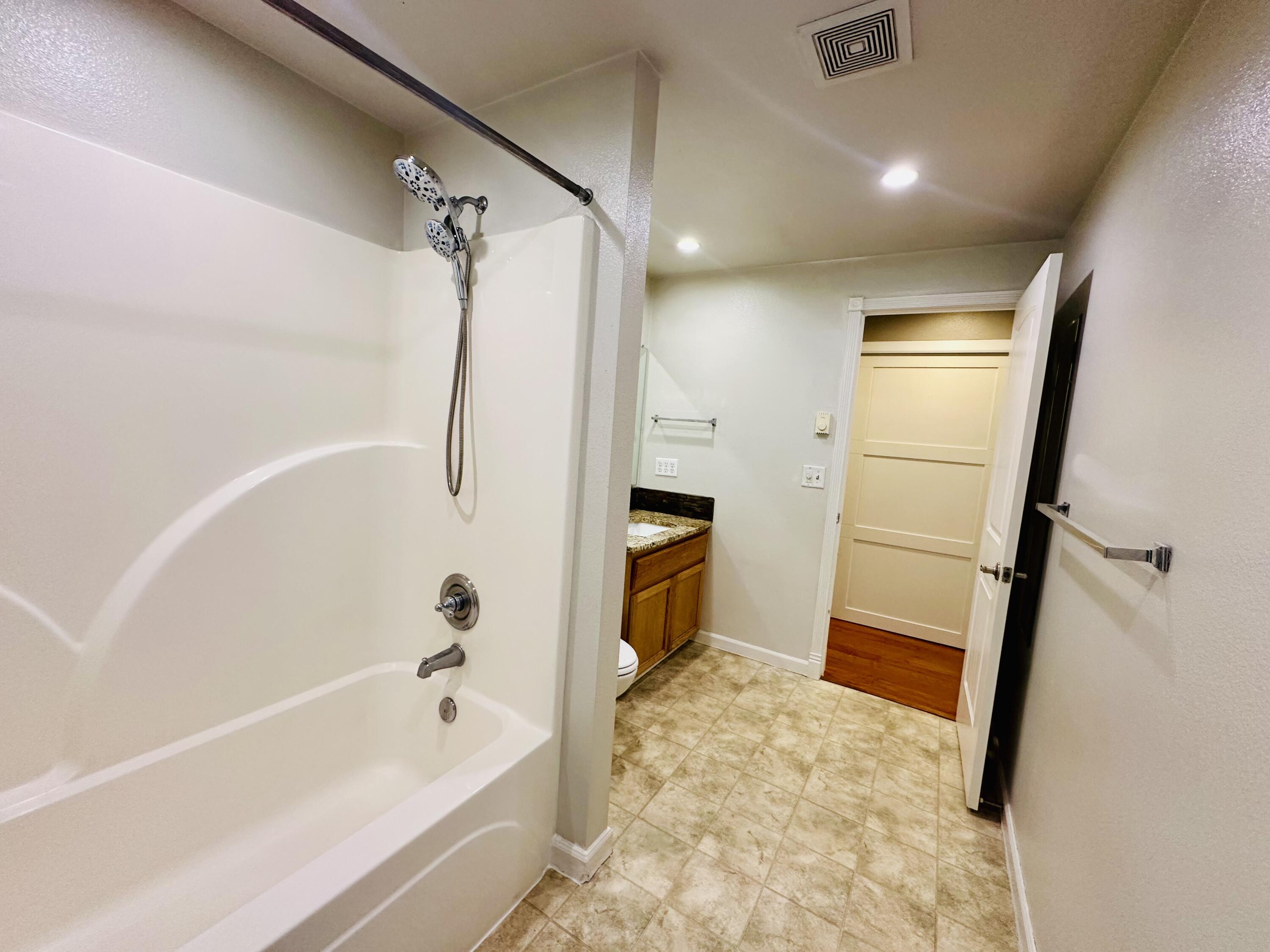 16524 Fieldcrest Road Klamath Falls, OR 97603 - Photo 28 of 58 a bathroom with a tub a sink and a shower