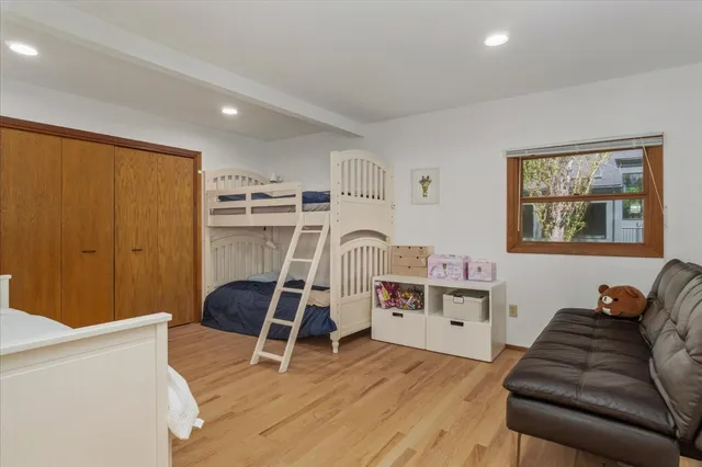 a view of a livingroom with furniture and a workspace
